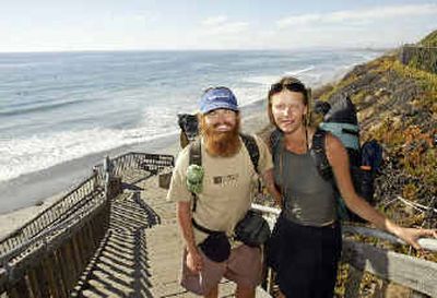 
Sarah Janes and Nate Olive  near the Pacific Ocean Thursday in Carlsbad, Calif. 
 (Associated Press / The Spokesman-Review)