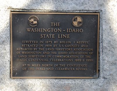 This is the plaque on a boulder that marks the Washington-Idaho stateline on the Centennial. (File / The Spokesman-Review)