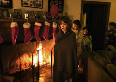 
An early Christmas:  The girls of Cottage II walk into the living room at 6 a.m. Sunday to celebrate Christmas. The children at the Hutton Settlement celebrate early because many  go home to visit with their families over the holidays. 
 (Photography by Jed Conklin / The Spokesman-Review)