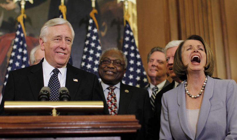 Speaker Nancy Pelosi of California laughs as Majority Leader Steny Hoyer of Maryland speaks during a press conference after the House passed health care reform in the U.S. Capitol in Washington, Sunday, March 21, 2010. (Charles Dharapak / Associated Press)