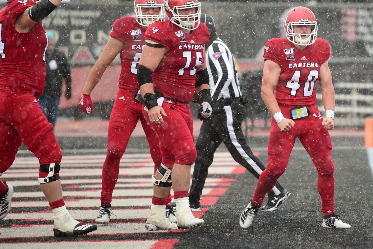 Eastern Washington University’s Silas Perreiah, right, celebrates a rushing touchdown against North Dakota Saturday, Sept. 28, 2019 at Roos Field in Cheney. (Jesse Tinsley / The Spokesman-Review)