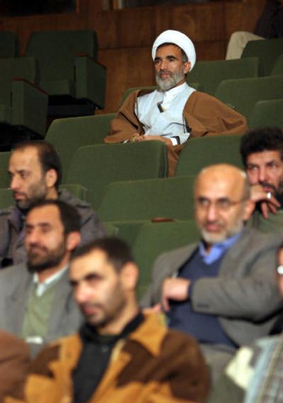 
An Iranian clergyman listens during a seminar on Iran's nuclear research at Tehran University on Tuesday. 
 (Associated Press / The Spokesman-Review)