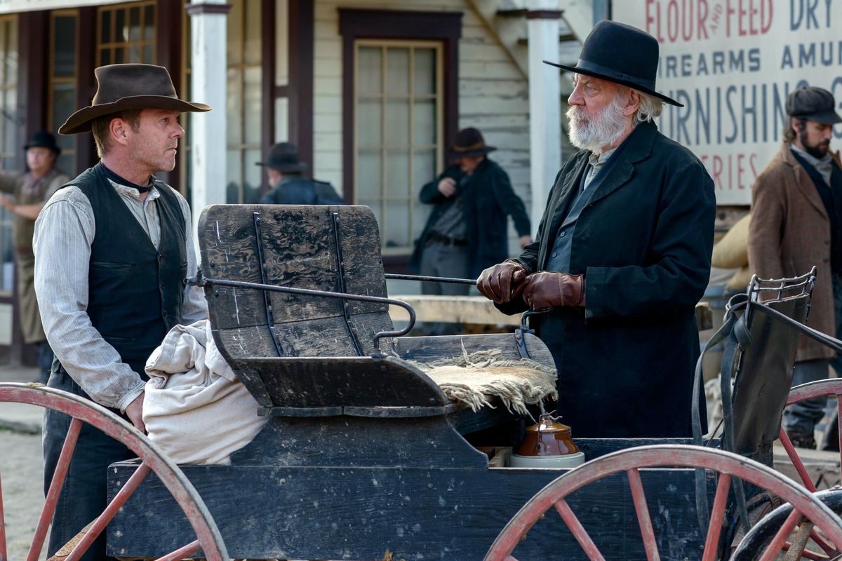 This photo provided by Momentum Pictures shows, Kiefer Sutherland, left, as John Henry Clayton and Donald Sutherland, right, as Reverend William Clayton, in the western Forsaken, a Momentum Pictures release. (Dan Power/Momentum Pictures via AP) ORG XMIT: CAET833 (Dan Power / AP)