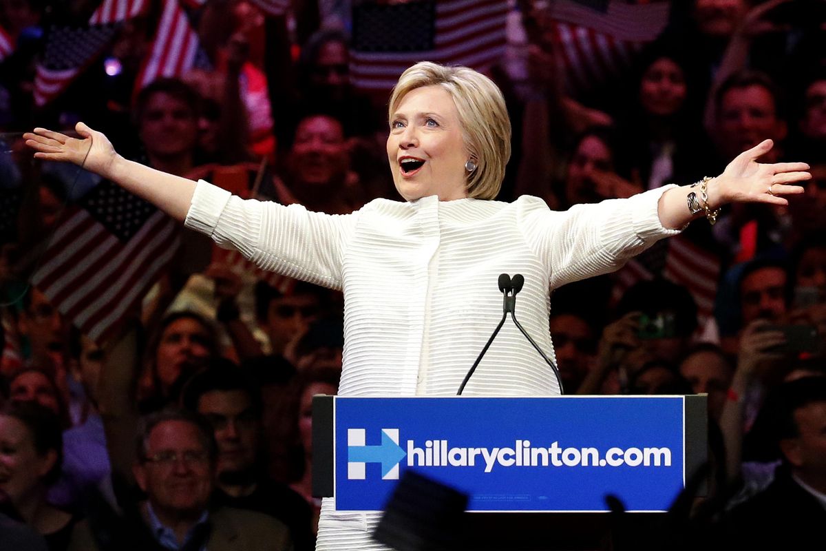 Democratic presidential candidate Hillary Clinton gestures as she greets supporters at a presidential primary election night rally, Tuesday, June 7, 2016, in New York. (Julio Cortez / Associated Press)