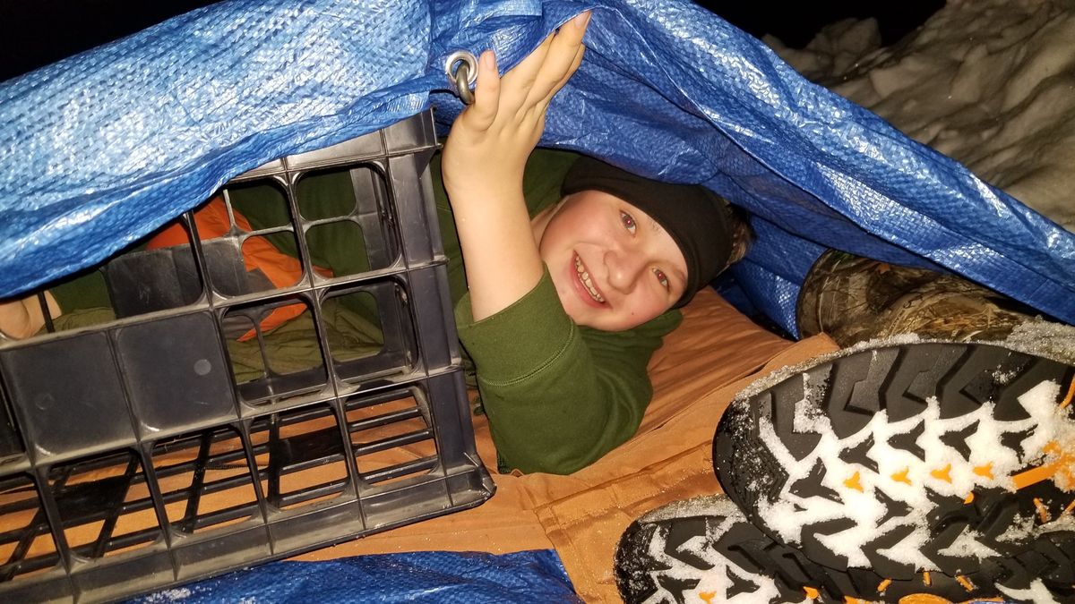 Isaac Ortman sleeps outside in a "bivy sack