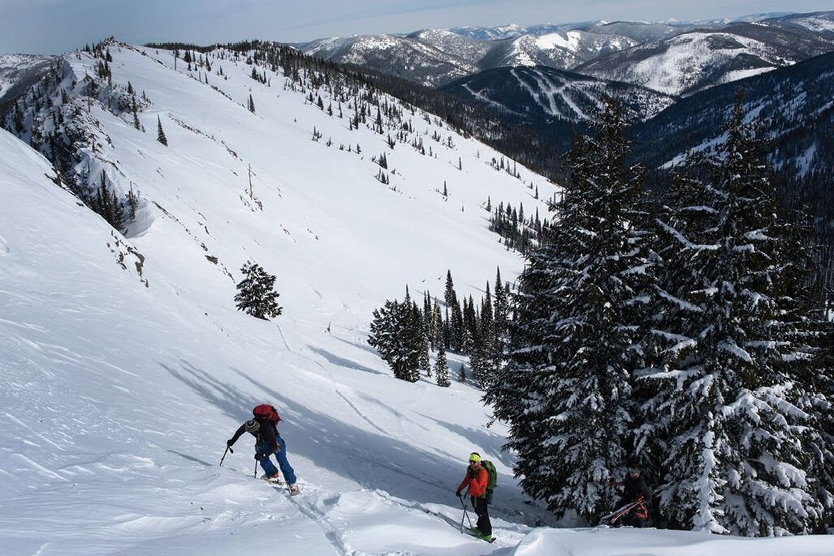 Backcountry skiers make their way up Stevens Peak in March along the Idaho-Montana border. Protect Our Winters, a group founded in 2007 to bring together winter athletes for advocacy on climate issues, has grown steadily in influence over the past decade.  (Eli Francovich/The Spokesman-Review)
