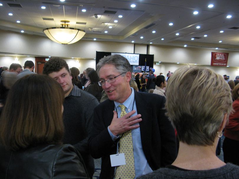 Nels Mitchell talks with supporters at the state Democratic Party election night party in Boise (Betsy Russell)