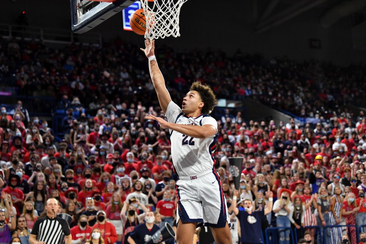 Gonzaga Bulldogs forward Anton Watson (22) lays in the ball during the first half of an exhibition college basketball game against Lewis-Clark State on Friday, Nov 5, 2021, at McCartney Athletic Center in Spokane, Wash.  (Tyler Tjomsland / The Spokesman-Review)