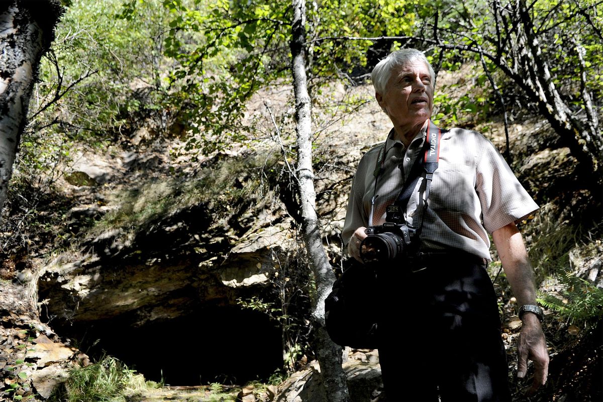 Tony Bamonte of Spokane stood near the tunnel of the Evolution Mine East of Kellogg, Idaho on Tuesday, September 10, 2013. He was researching and writing a book about the Coeur d