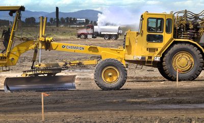 Earthmovers and water trucks work at the West Plains site of the new Peirone Produce warehouse on  Thursday. (CHRISTOPHER ANDERSON / The Spokesman-Review)