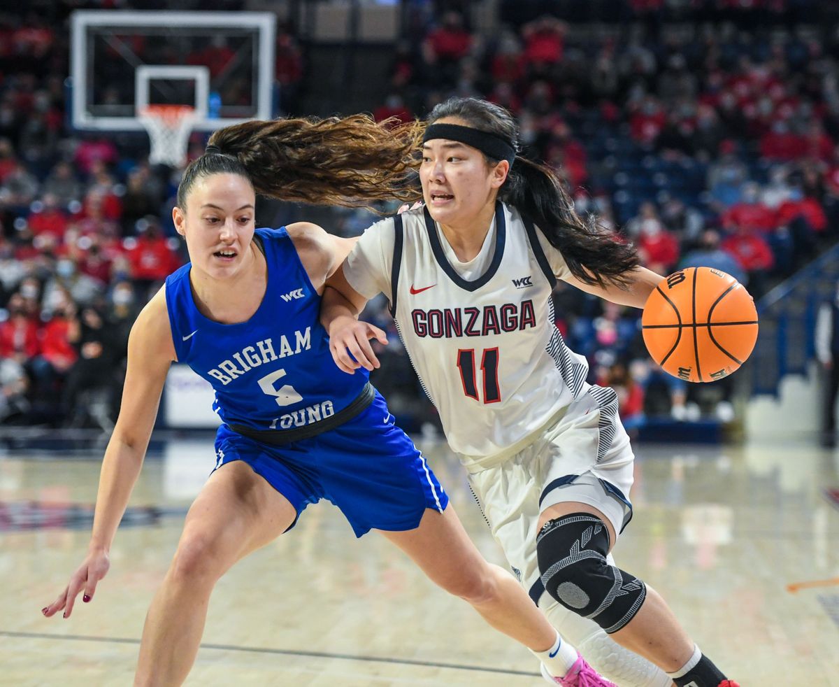 Gonzaga guard Kayleigh Truong turns the corner on BYU guard Maria Albiero, Saturday, Feb, 5, 2022, in the McCarthey Athletic Center.  (Dan Pelle/THE SPOKESMAN-REVIEW)