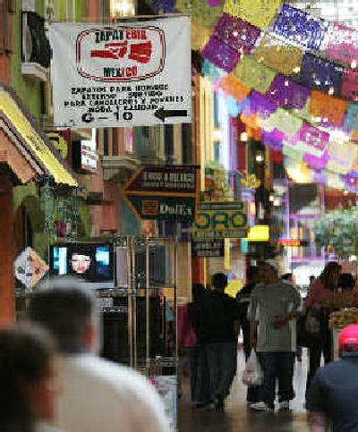 
Signs point to Hispanic businesses at a mall in Chamblee, Ga., Tuesday. Fueled by a rapidly expanding Hispanic consumer market, the number of Hispanic-owned businesses is growing much faster than the national rate for other companies. 
 (Associated Press / The Spokesman-Review)