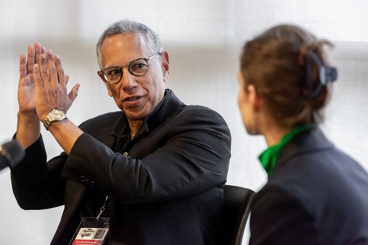 Dean Baquet, former executive editor of the New York Times, and Lisa Waananen Jones, scholarly associate professor, talk about the challenges of communicating the truth at the Compton Union Building on Tuesday in Pullman. Baquet received the Murrow Lifetime Achievement Award in Journalism at Washington State University’s Murrow Symposium.  (Geoff Crimmins/For The Spokesman)