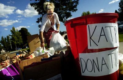 
Sharon Larson picks up donated items from Hamblen Elementary School on Thursday to aid Hurricane Katrina survivors. 
 (Holly Pickett / The Spokesman-Review)