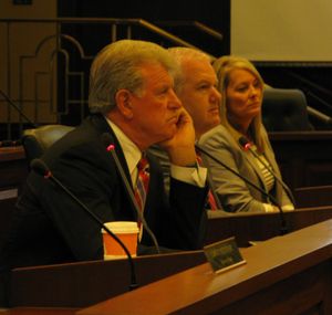 Gov. Butch Otter, state Controller Brandon Woolf, and state schools Superintendent Sherri Ybarra at the state Land Board's meeting on Tuesday morning (Betsy Z. Russell)