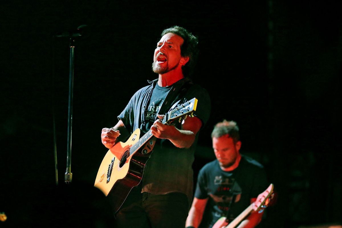 Eddie Vedder, left, and Jeff Ament of Pearl Jam perform at Wrigley Field on Aug. 20, 2016, in Chicago. Pearl Jam released its third album, "Vitalogy," in 1994.    (Nuccio DiNuzzo/Chicago Tribune/TNS)