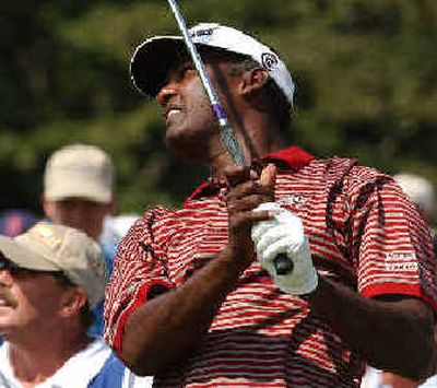 
Vijay Singh leads by two strokes heading into the final day of the Deutsche Bank Championship.
 (Associated Press / The Spokesman-Review)