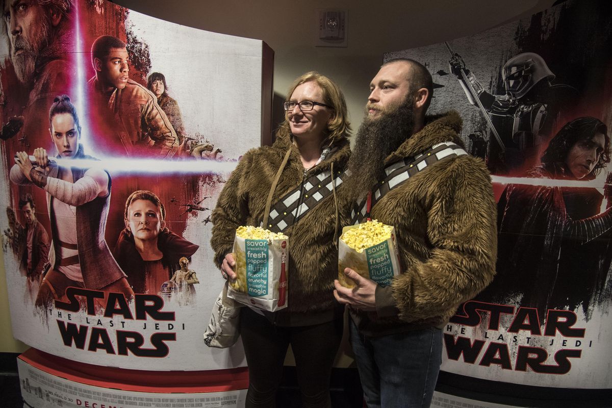 Kristen and Charlie King wore their Wookie coats to the new movie ÒStar Wars: The Last Jedi.Ó Thursday, Dec. 14, 2017 at the AMC River Park Square theater. (Dan Pelle / The Spokesman-Review)