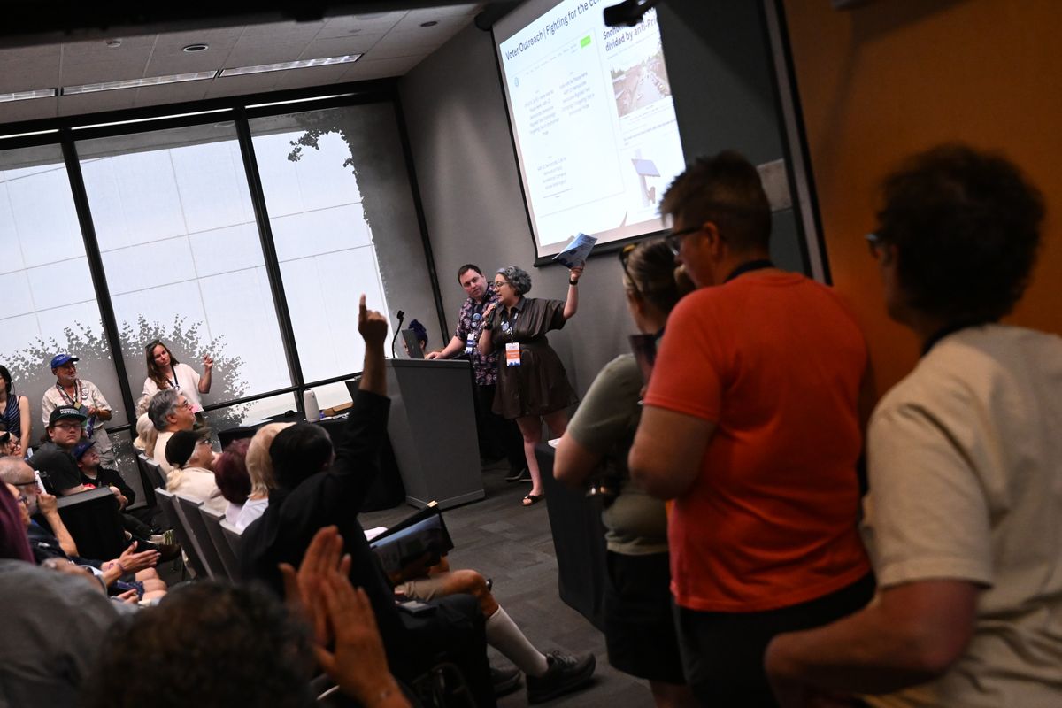 Delegates discuss voter outreach Saturday during the 2026 Washington Democrats Annual Convention at the Spokane Convention Center.  (Tyler Tjomsland/The Spokesman-Review)