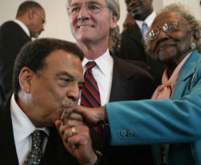
The Rev. Andrew Young, left, former mayor of Atlanta, kisses the hand of Rosa Parks' best friend, Johnnie Carr, 94, at the end of a  service in honor of Parks at Dexter Avenue King Memorial Baptist Church in Montgomery, Ala., on Friday. 
 (Associated Press / The Spokesman-Review)