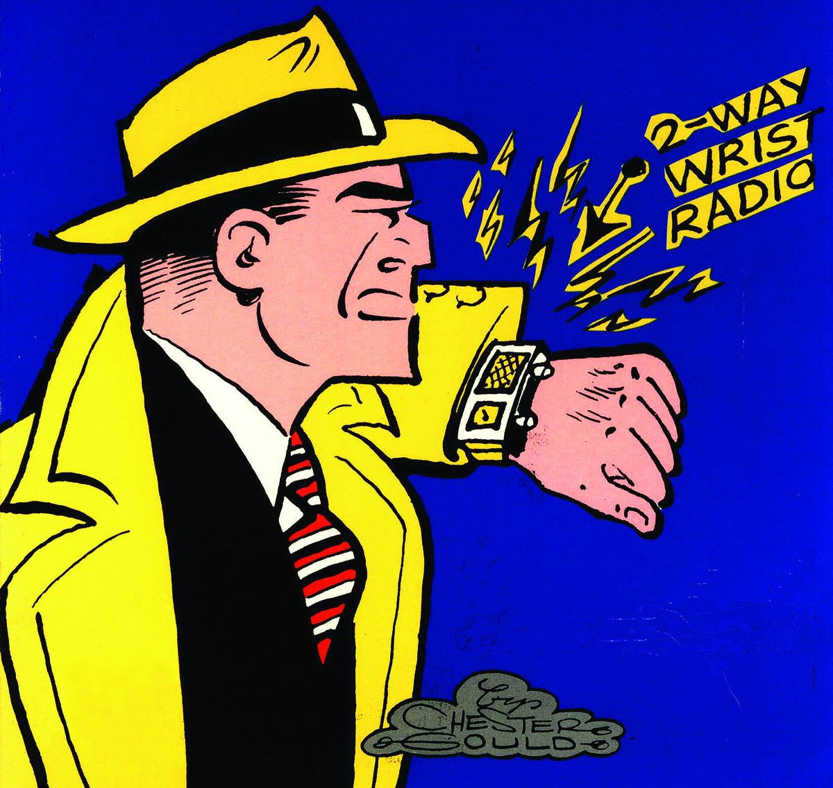 Cartoon police detective Dick Tracy uses his 2-way wrist-radio in this frame from the classic comic strip created by Chester Gould. Scientists are pursuing technology that could lead to a real-life version of the handy device, 53 years after it was introduced by Gould.  (Tribune Media Services 1999)
