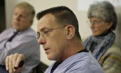 
Barbaro's co-owners, Roy and Gretchen Jackson, look on as chief surgeon Dr. Dean Richardson fields questions. 
 (Associated Press / The Spokesman-Review)