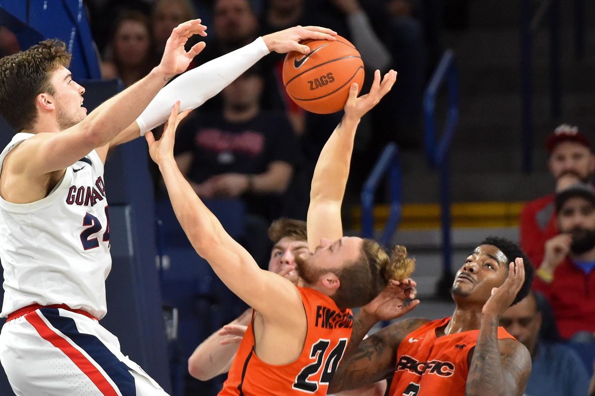Gonzaga Bulldogs forward Corey Kispert (24) blocks Pacific Tigers guard Broc Finstuen (24) during the second half of a college basketball game on Saturday, January 25, 2020, at McCarthey Athletic Center in Spokane, Wash. Gonzaga won the game 92-59. (Tyler Tjomsland / The Spokesman-Review)