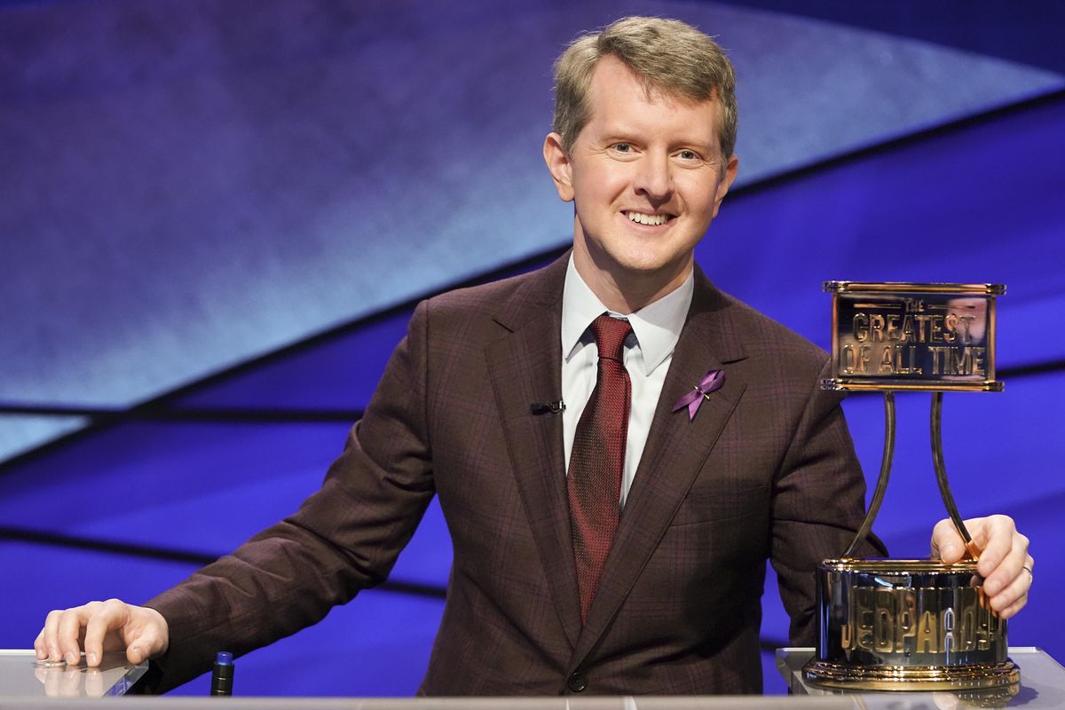 This image released by "Jeopardy!" shows Ken Jennings, a 74-time champion on the the set of the popular quiz show. Jennings will be the first interim guest for the late Alex Trebek, and the show will try other guest hosts before naming a permanent replacement.  (Eric McCandless)