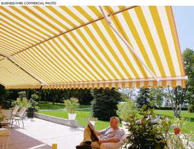 This homeowner enjoys added sun protection and cooler temperatures provided by an awning.
(Business Wire / The Spokesman-Review)