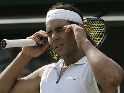 
Rafael Nadal reacts during his loss to Gilles Muller  in a second-round match. 
 (Associated Press / The Spokesman-Review)