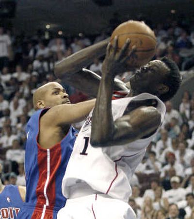 Samuel Dalembert, right, and the 76ers stunned Detroit on Friday. Associated Press
(Associated Press / The Spokesman-Review)