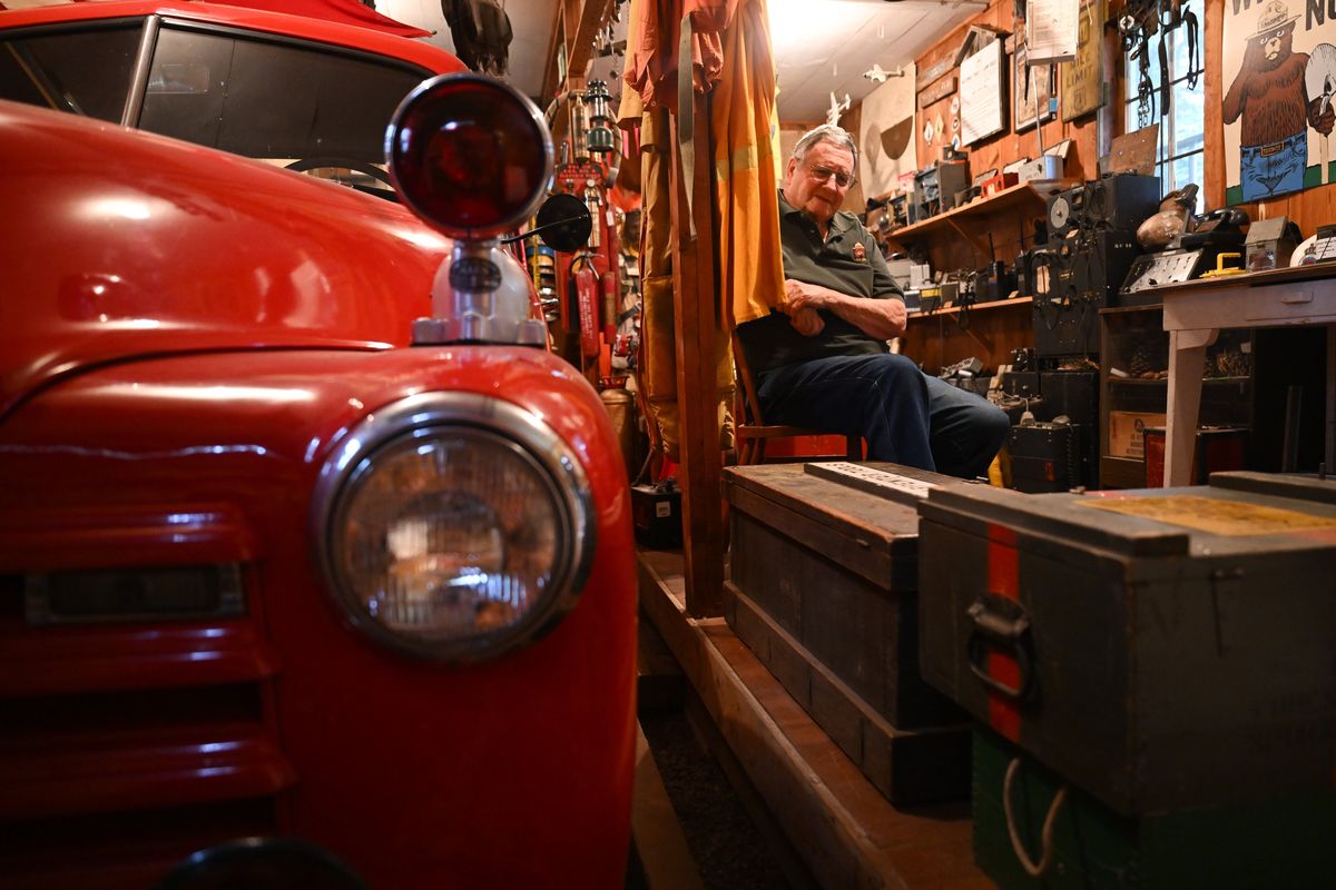 Ray Kresek shows his collection of fire equipment and memorabilia. (Tyler Tjomsland/The Spokesman-Review)