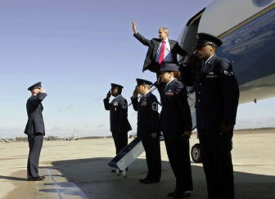 
President Bush boards Air Force One on Saturday at Andrews Air Force Base, Md. Bush attended his first rally of this election season Saturday in Indiana.
 (Associated Press / The Spokesman-Review)