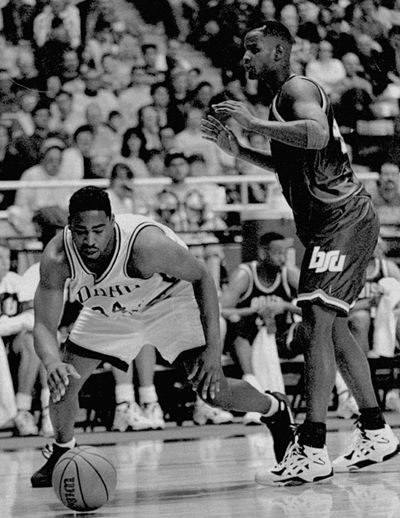 Former University of Idaho basketball player Orlando Lightfoot, left, scored 2,102 points in three seasons, making him the all-time leader for the Vandals and Big Sky Conference. (Associated Press)