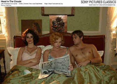 Penelope Cruz as Mia, left, Charlize Theron as Gilda and Stuart Townsend as Guy in