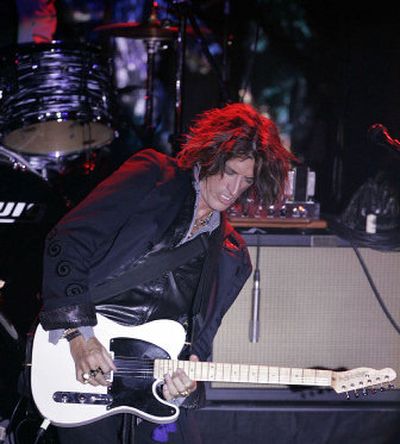 
Aerosmith and lead guitarist Joe Perry: Their latest effort, 
