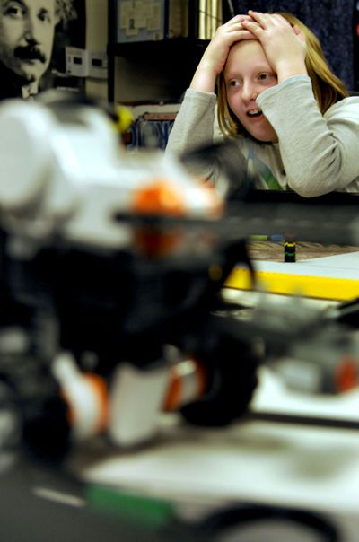 Timmi Short, a fifth-grader at Post Falls’ Ponderosa Elementary, watches her robot go off course during a gifted class focusing on robotics Oct. 21. “This is about problem-solving,” said instructor Karlicia Berry.kathypl@spokesman.com (Kathy Plonka / The Spokesman-Review)