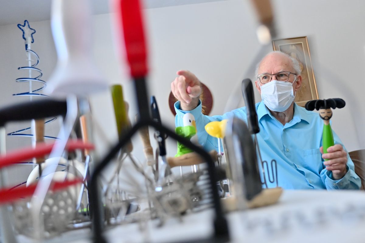 John Wagner a retired GU Philosophy professor shows of his collection of potato mashers on Tuesday, Feb 22, 2022, at his home in Spokane, Wash.  (Tyler Tjomsland/The Spokesman-Review)