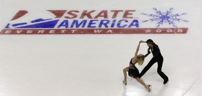 Ice dancing couple Pernelle Carron and Mathieu Jost, of France, practice Thursday for  Skate America  in Everett.  (Associated Press / The Spokesman-Review)