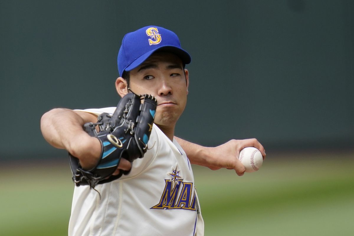 Seattle Mariners starting pitcher Yusei Kikuchi throws against the Texas Rangers in the sixth inning of a baseball game Sunday, May 30, 2021, in Seattle.  (Elaine Thompson)