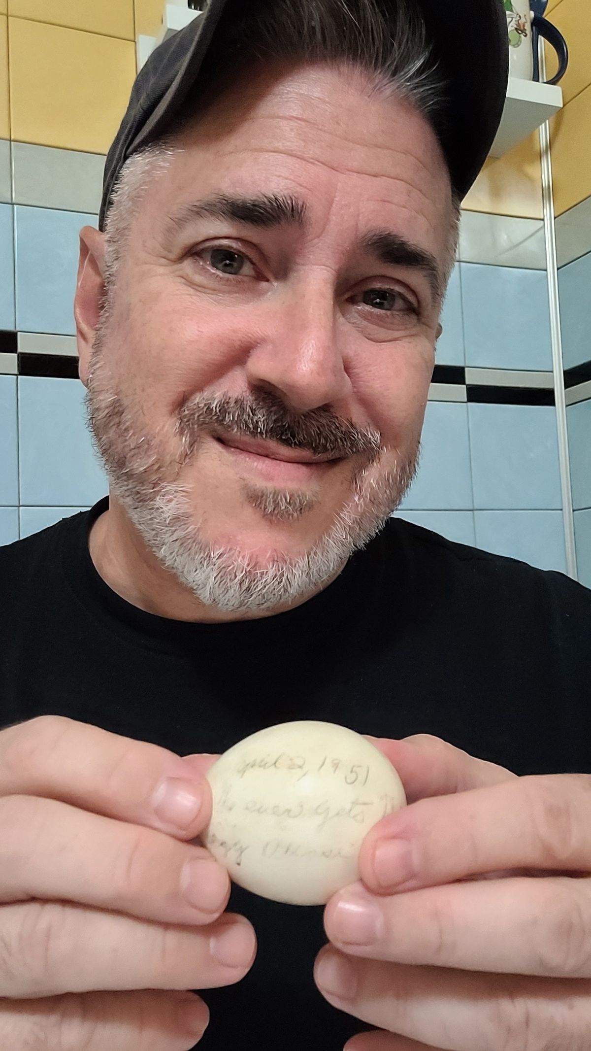 John Amalfitano with the egg signed by Mary Foss Starn in 1951. MUST CREDIT: Photo courtesy of John Amalfitano  (Courtesy of John Amalfitano/Family photo)