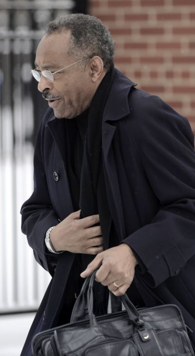 Sen. Roland Burris, D-Ill., leaves his home in Chicago on Saturday.  (Associated Press / The Spokesman-Review)