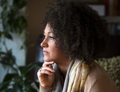 FILE - In this March 2, 2015, file photo, Rachel Dolezal, president of the Spokane chapter of the NAACP, poses for a photo in her Spokane, Wash., home. Dolezal resigned Monday, June 15, 2015, amid a furor over racial identity that erupted when her parents came forward to say she has been posing as black for years when she is actually white. (Colin Mulvany/The Spokesman-Review via AP, File) (Colin Mulvany / The Spokesman-Review)