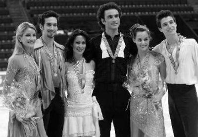 
Ice dancing medalists at Four Continents, from left: Tanith Belbin and Benjamin Agosto, second; Marie-France Dubreuil and Patrice Lauzon, first; and Tessa Virtue and Scott Moir, third. 
 (Associated Press / The Spokesman-Review)