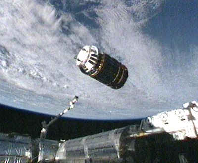 In this image  from NASA TV, an unpiloted supply ship makes its final approach to the  space station Thursday.  (Associated Press / The Spokesman-Review)