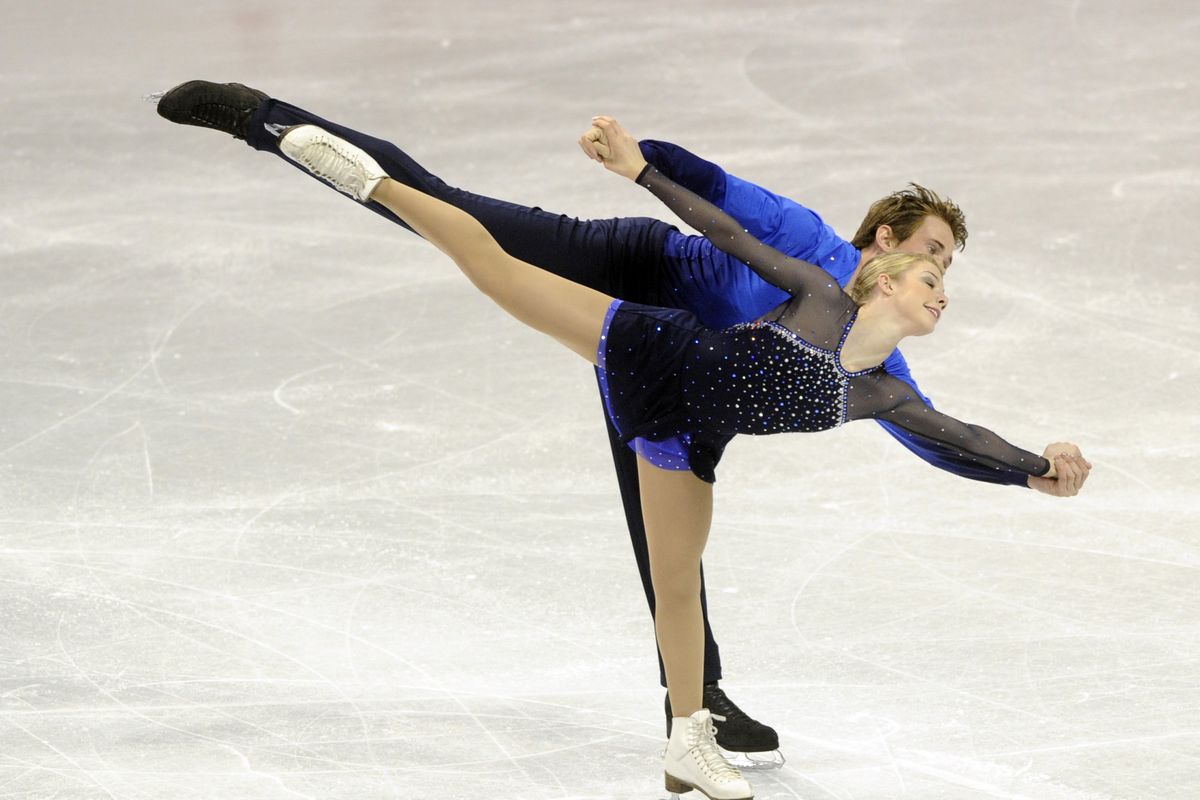  Amanda Dobbs and Joseph Jacobson perform during their free skate at the U.S. Figure Skating Championships in the Spokane Arena Saturday,  Jan. 16, 2010. (Colin Mulvany / The Spokesman-Review)
