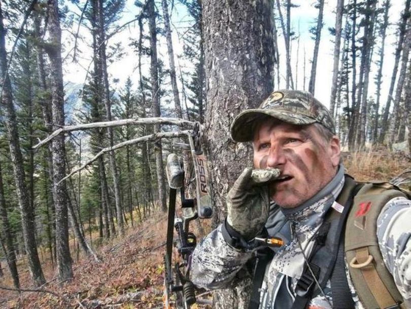 Bob Legasa of Hayden mouths a cow elk call while bowhunting for bull elk in Montana in September. (SR photo)