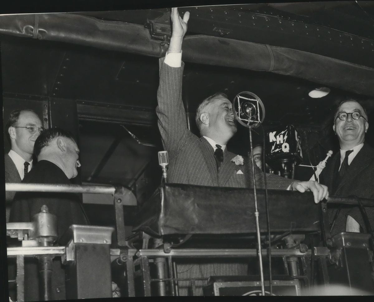 President Franklin Roosevelt addressed a huge throng from the rear platform of his train at 5:30 p.m. Oct. 2, 1937, upon his arrival at the Great Northern station in Spokane from Grand Coulee Dam.  (Cowles Publishing)