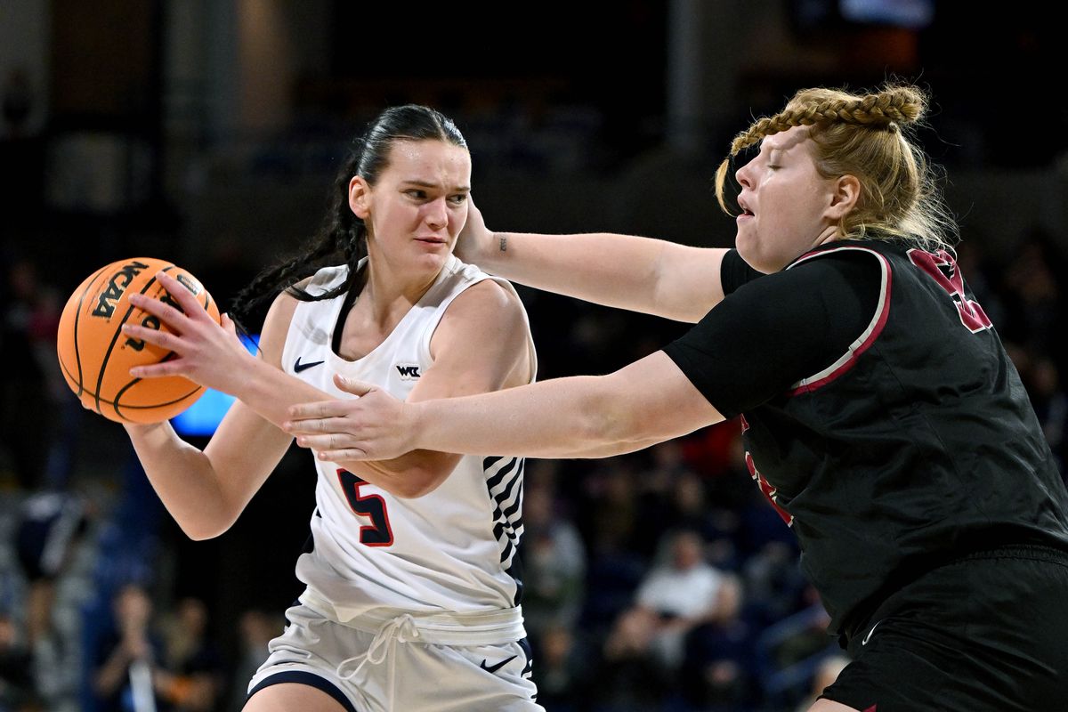 Gonzaga forward Maud Huijbens (5) eyes defender Santa Clara forward Emma Shaffer (52) during the second half of a NCAA college basketball game, Thursday, Jan. 11, 2024, in the McCarthey Athletic Center.  (COLIN MULVANY)