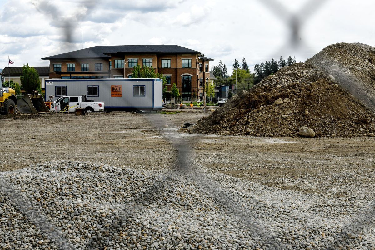 Crews work in May at the site of the new Spokane Valley Library. The locale also will be home one day to an expanded Balfour Park.  (Kathy Plonka/The Spokesman-Review)
